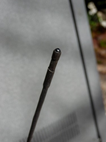 tip of a heat-shrink armored whip antenna